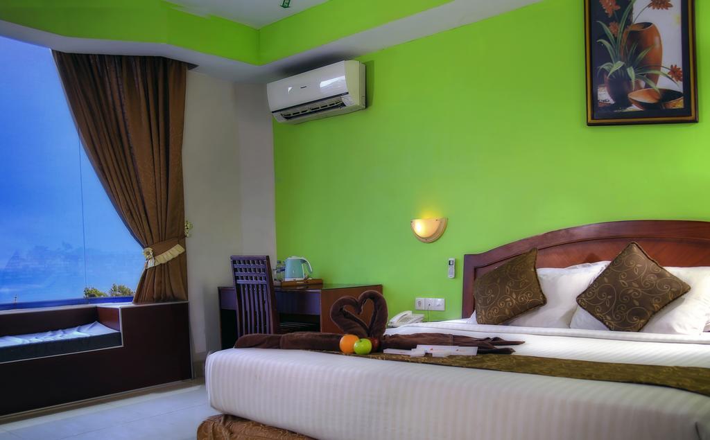 Grand Hotel Jambi Pokoj fotografie
